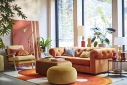 DFS Belair three-seater sofa bed in orange sensual velvet