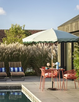 SS24 SUMMER RESORT - Lois Lounger &pound;199 / Scallop Bolster Outdoor Cushion &pound;17.50 / Lois Dining Set &pound;229 / Colby Table Lamp &pound;39 / Set of 2 Speckled Wine Glasses &pound;16 / Set of 4 Check Cereal Bowls &pound;15 / Set of 4 Stripe Dinner Plates &pound;15 / Set of 3 Nibble Bowls &pound;8 / Amalfi Parasol &pound;199 / Set of 2 Outdoor Cushions &pound;25